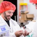 Student James Crooke, from Australia, samples a strawberry ice cream during the second of a three-day, ice cream-making workshop at UW-Madison's Babcock Hall.