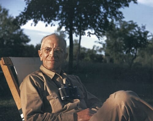 Photo: Aldo Leopold sitting in a chair outdoors