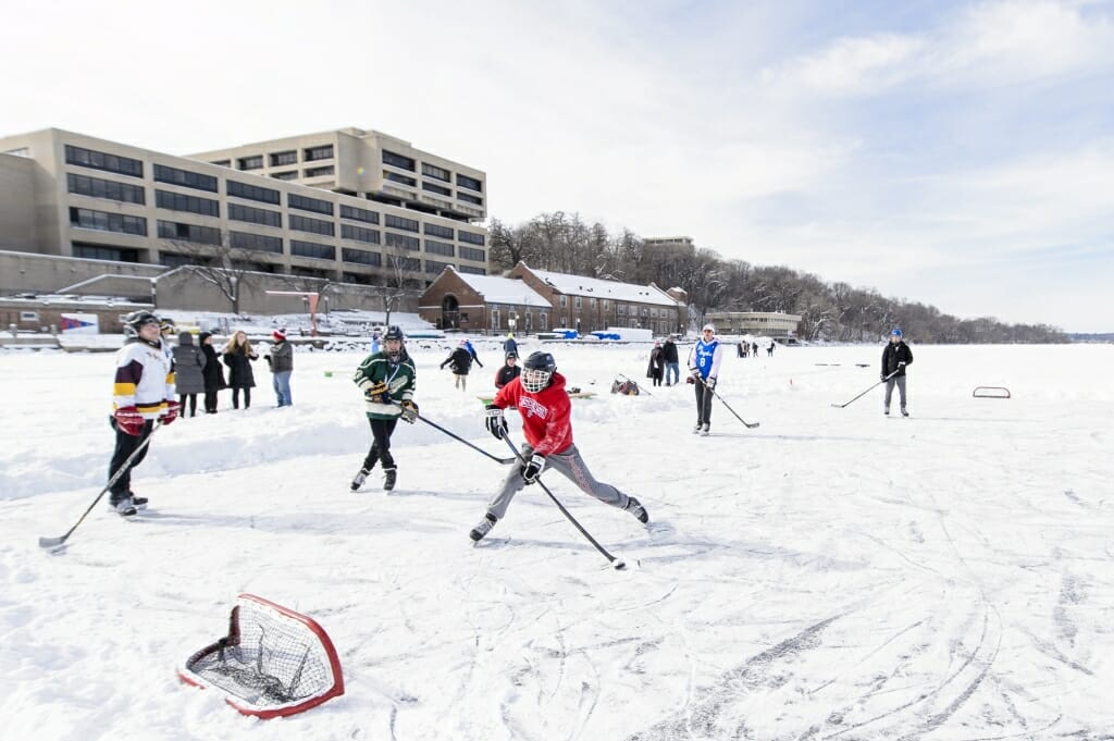 Photo of students playing hockey.