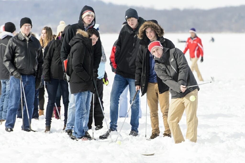 Photo of Joe Tenpenny and friends playing a round of ice golf.