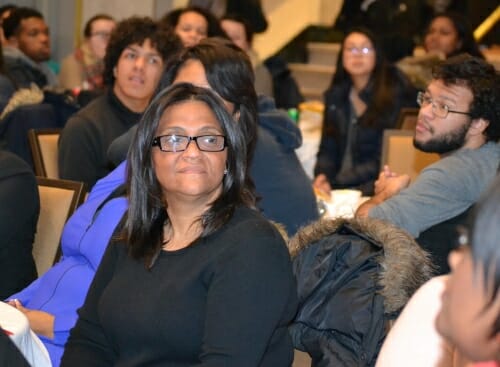 Photo: Elizabeth Santiago sitting in crowd