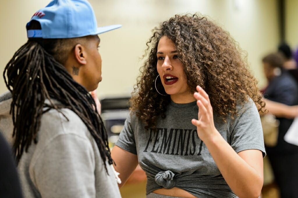 Undergraduate Kaitlynne Roling, a Chancellor-Powers Knapp Scholar, talks with Waithe during a meet-and-greet session with invited UW-Madison students.