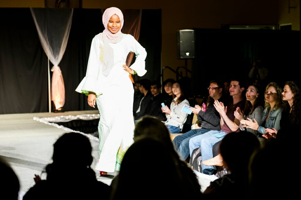 Student Bintou Suso models mbazin riche, which is fabric worn by both men and women on Fridays and on festive occasions in Gambia and elsewhere in west Africa.
