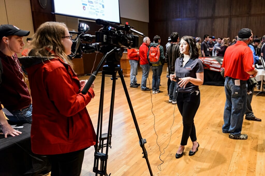 UW-Madison Badgerloop president Kali Kinziger, a senior majoring in communications, speaks with members of the media at the unveiling.