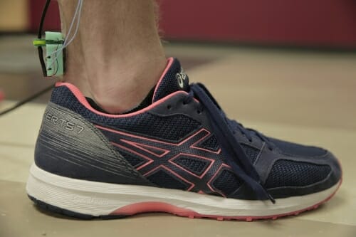 Photo: Foot with device attached to Achilles tendon