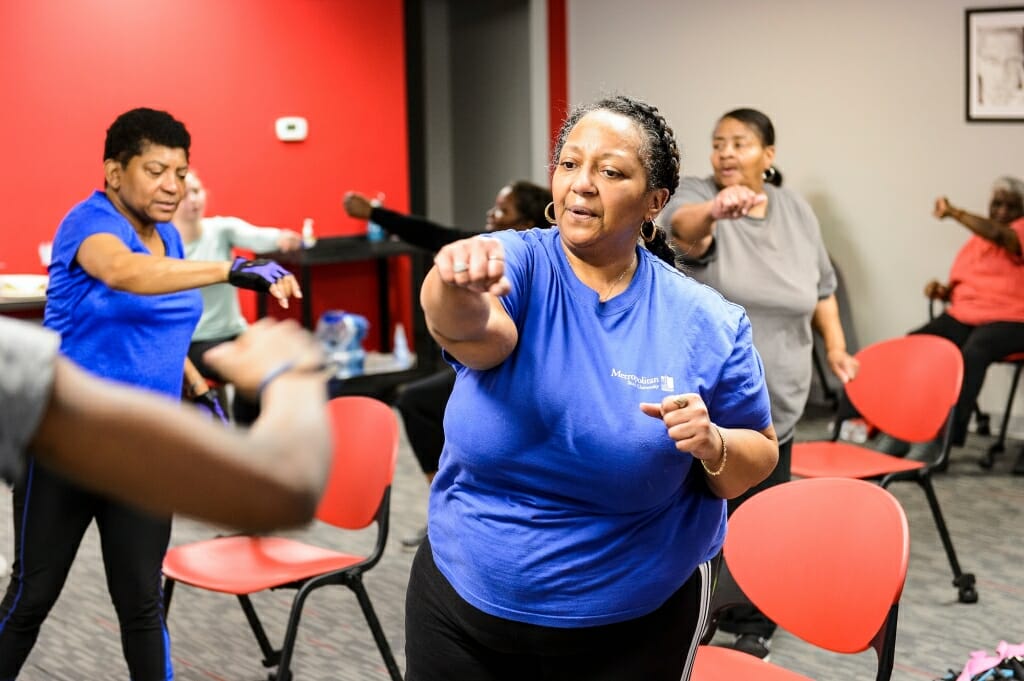 Photo: Jovita Hogan, right, keeps the cardio routine going