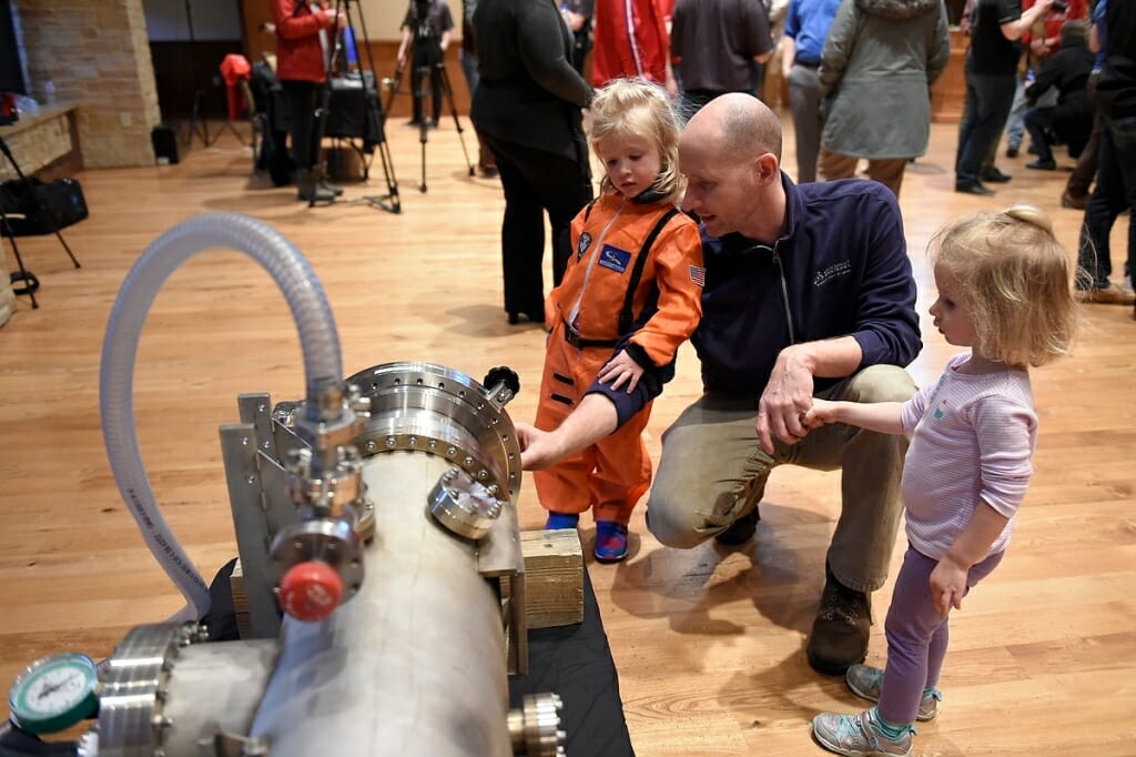 Future astronaut Madeline Stendel checks out the hardware at the Badgerloop Pod III reveal on Thursday at Varsity Hall in Union South. Badgerloop Pod III — its latest entry into the 2018 SpaceX Hyperloop Competition, an event designed to spur new ideas about an ultrafast, futuristic form of transportation.