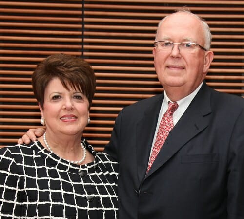 Photo: John Rowe with arm around Jeanne Rowes shoulder