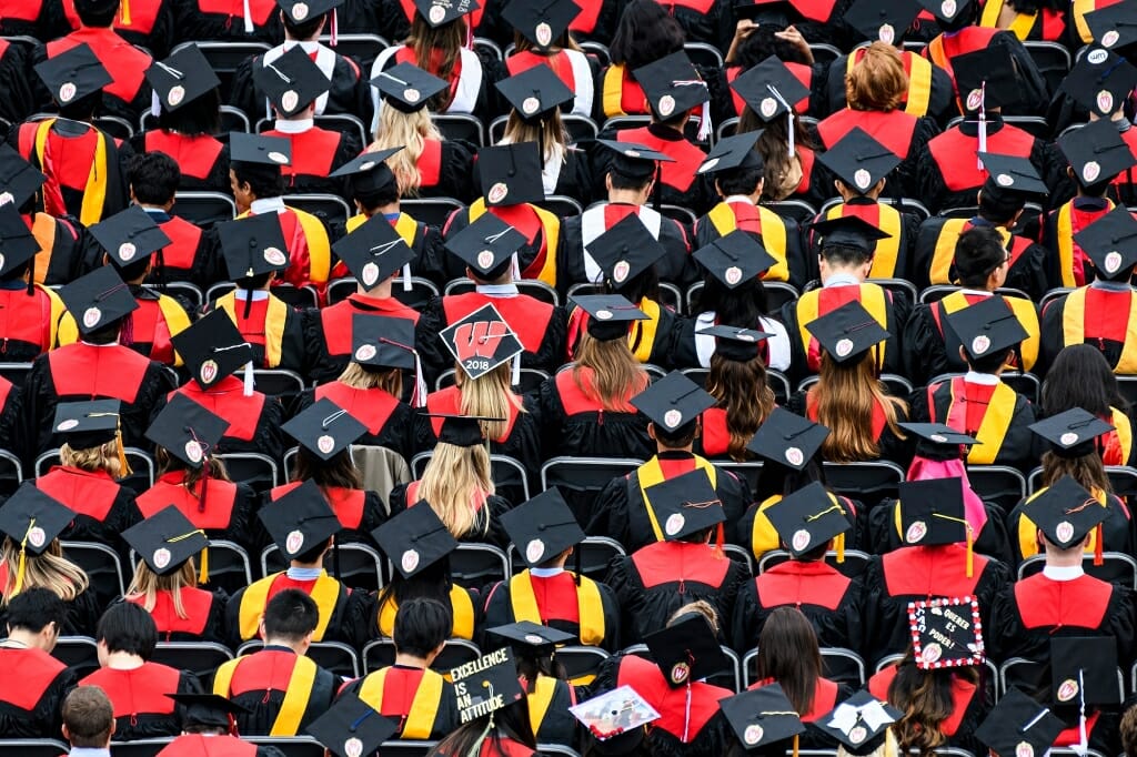 Photo of rows of seated graduates.