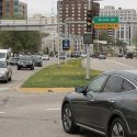 Photo: Car waiting to turn left at busy intersection