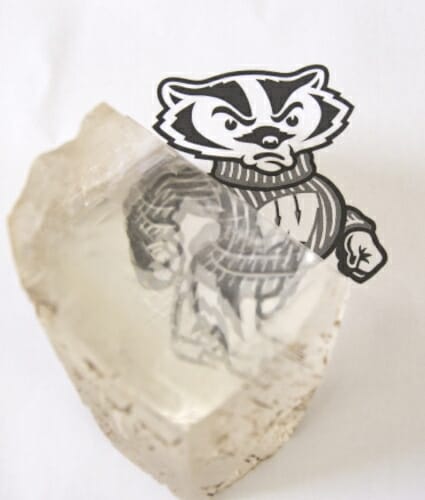 Photo: Double-image of Bucky Badger picture shown through calciite