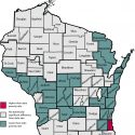 A map showing that Milwaukee County's poverty rate is higher than the state average and 26 counties have rates below the state average.