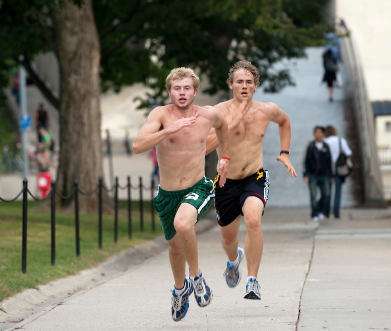 A photo of students doing wind sprints up Bascom Hill. 