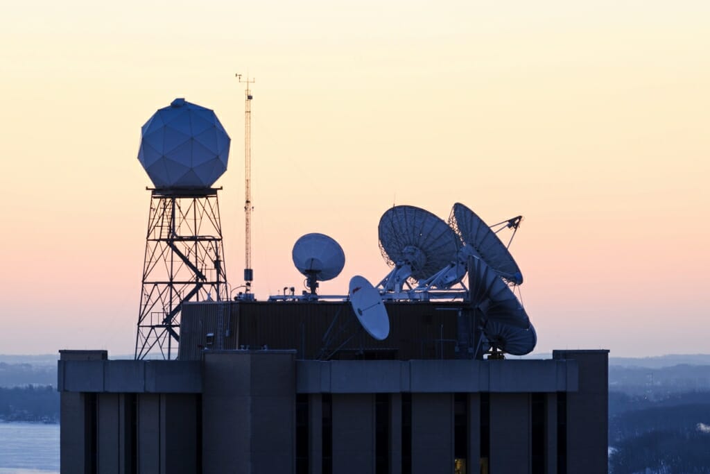 Photo: Weather instruments on roof of building