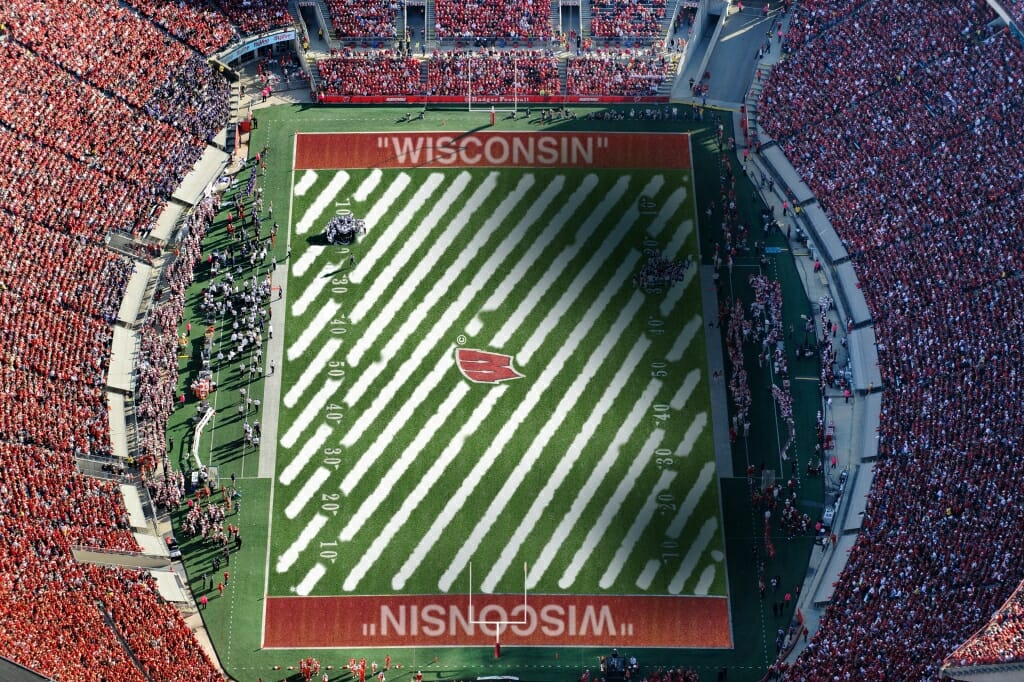 Camp Randall's field with diagonally painted yard lines, an homage to Off White's clothing, which often features diagonally spray-painted lines. 