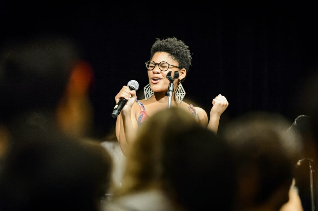 UW student Jamie Thompson performs on the live band karaoke stage.