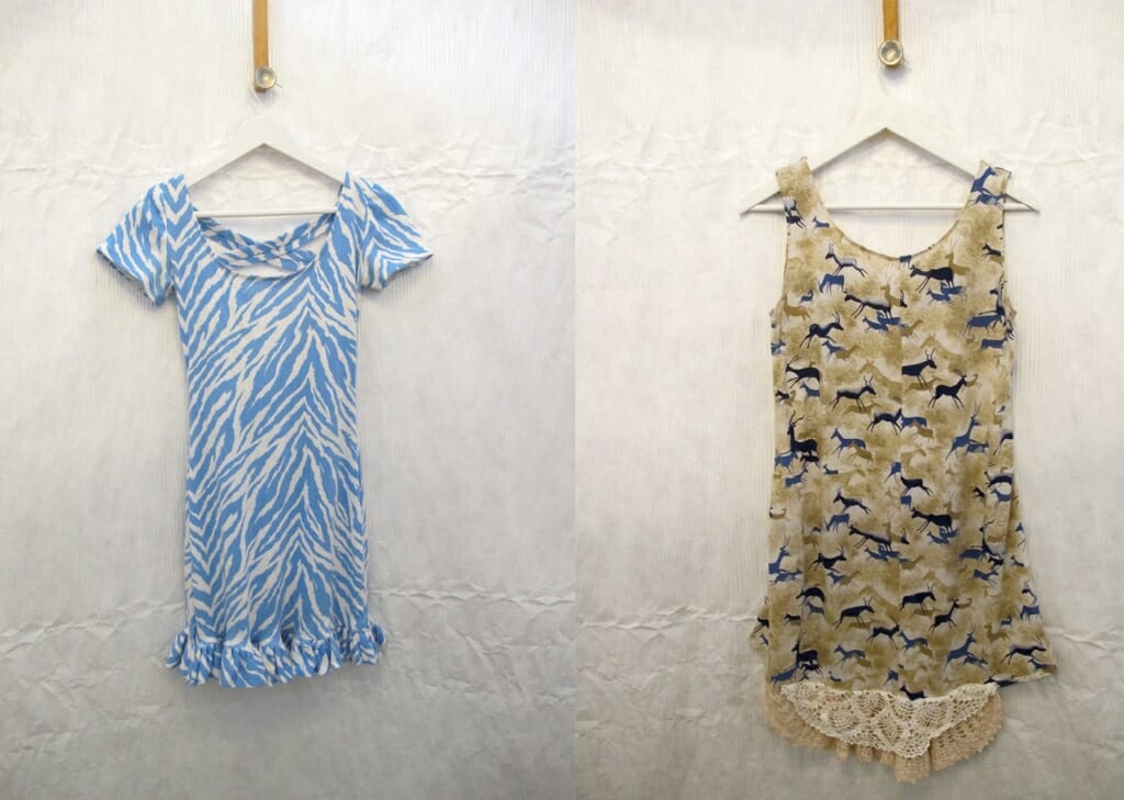 Two dresses designed by Emily Popp. One is a blue and white striped print dress and the other is a beige dress that features the silhouettes of deer.