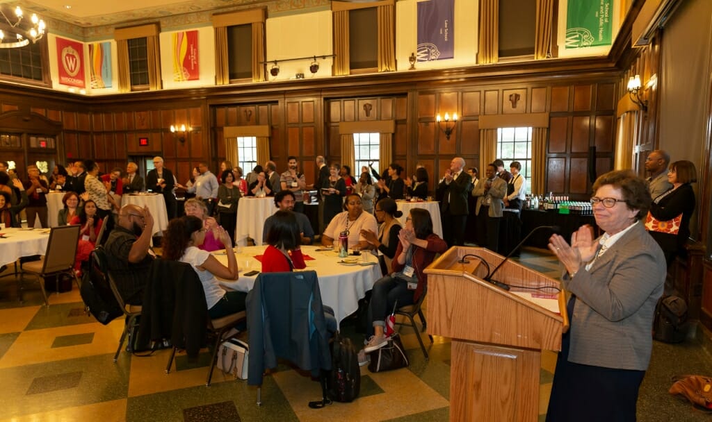 Chancellor Blank addresses a room full of people.