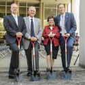 Officials line up before the groundbreaking.