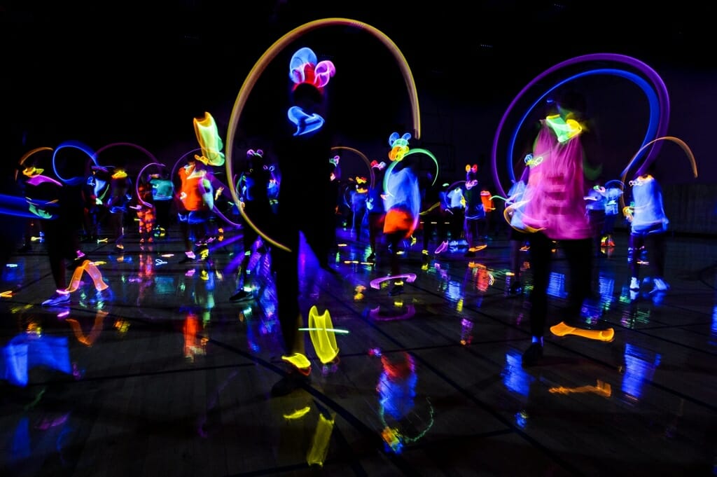 Students take part in a glow-in-the-dark group Zumba class at the Natatorium on Sept. 20.