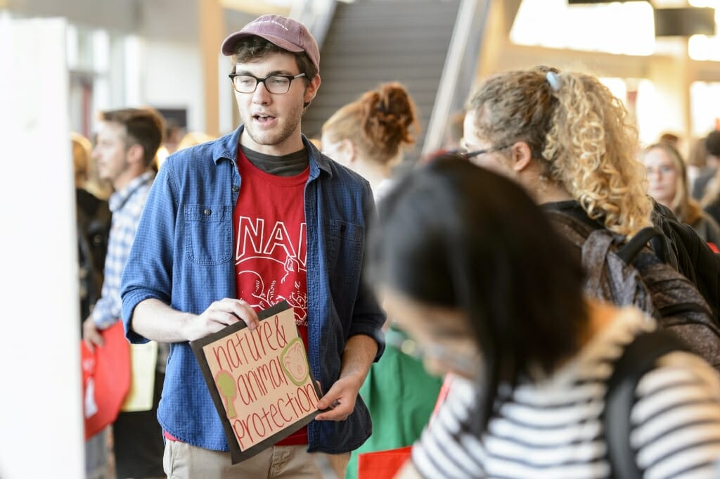 Students check out the UW Nature and Animal Protection booth.