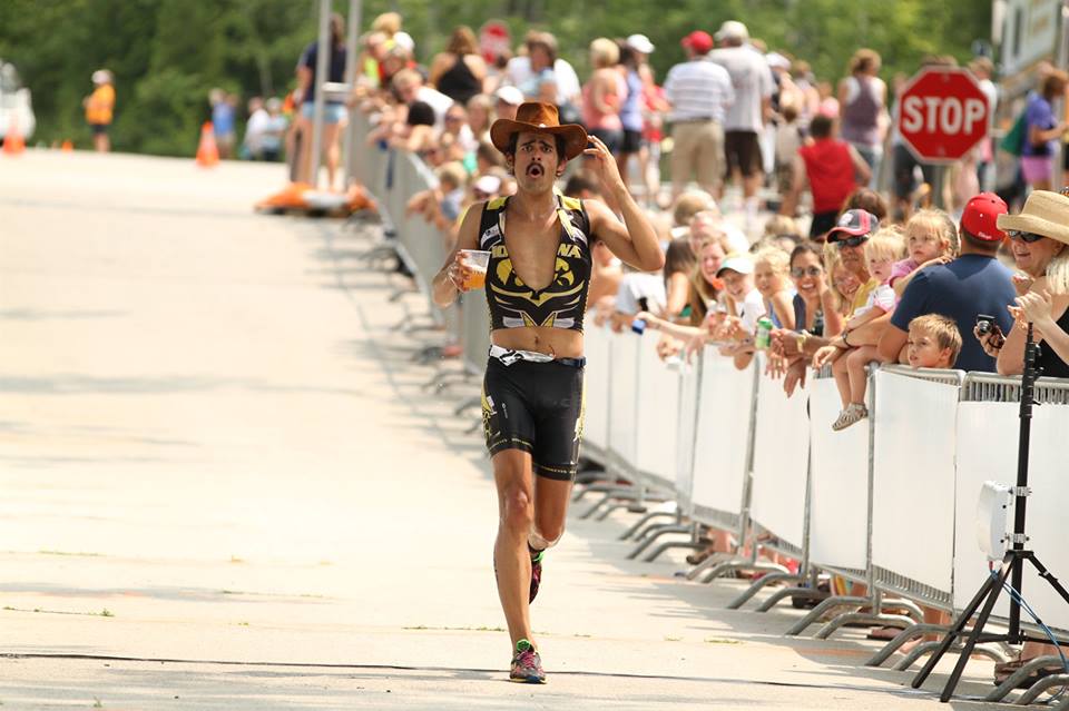 Parr running a race with a cowboy hat on. 