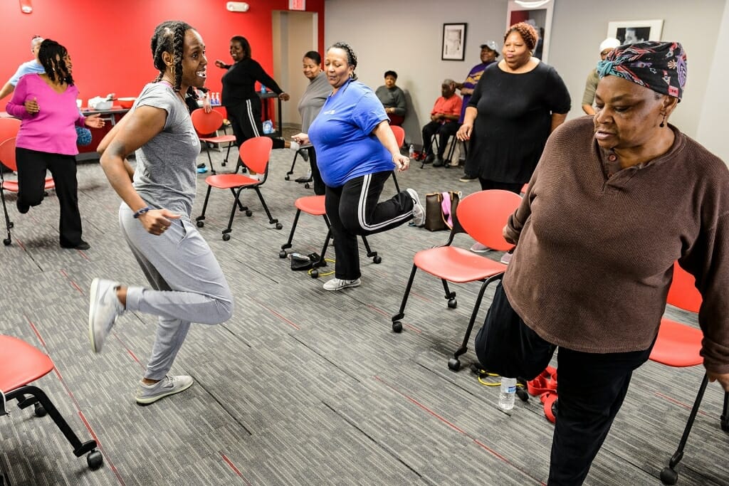 Photo: People exercising in fitness class