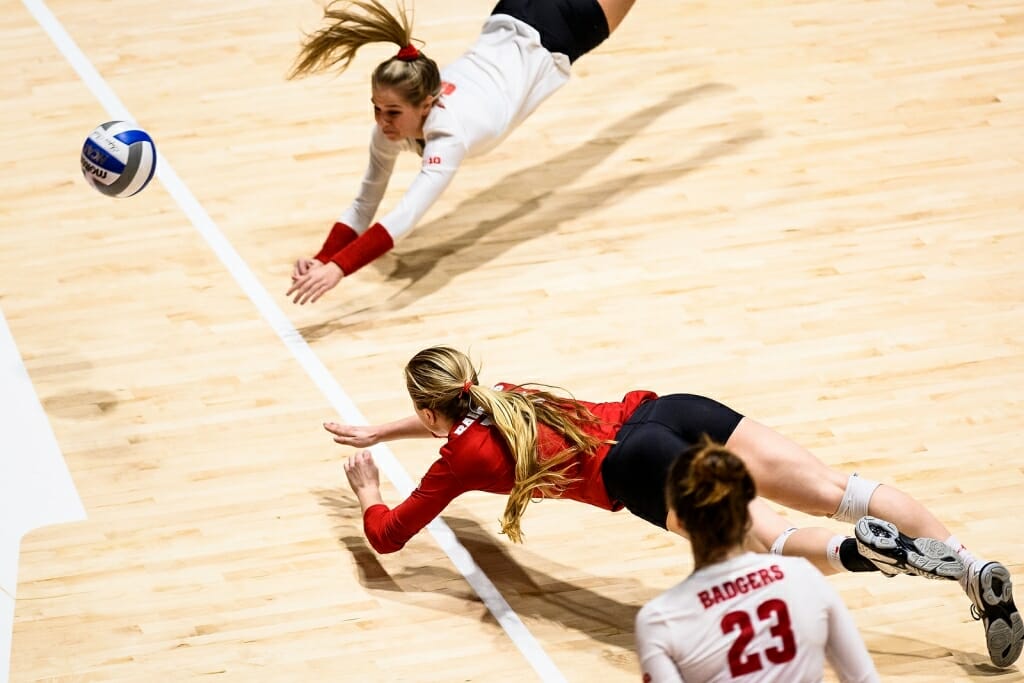 Photo: Volleyball players diving for ball