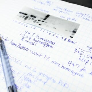 Photo: Closeup of notebook with handwritten notes