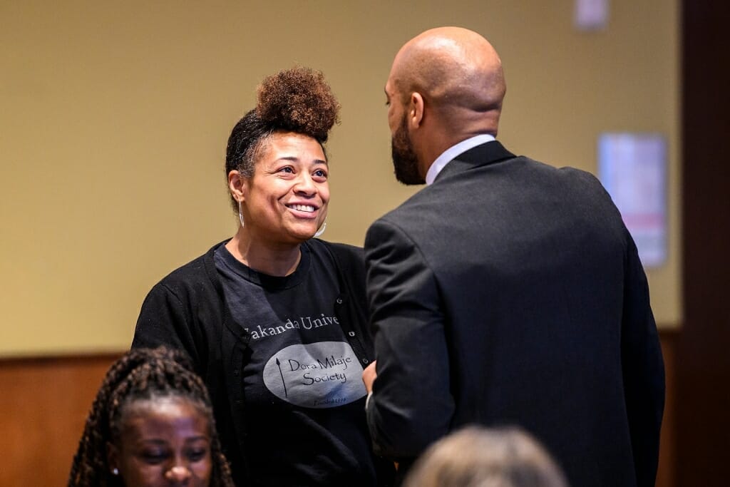 Photo: Lt. Gov. Mandela Barnes talks with a former teacher of his.