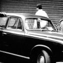 Photo: Meg Bortin leaning on a car