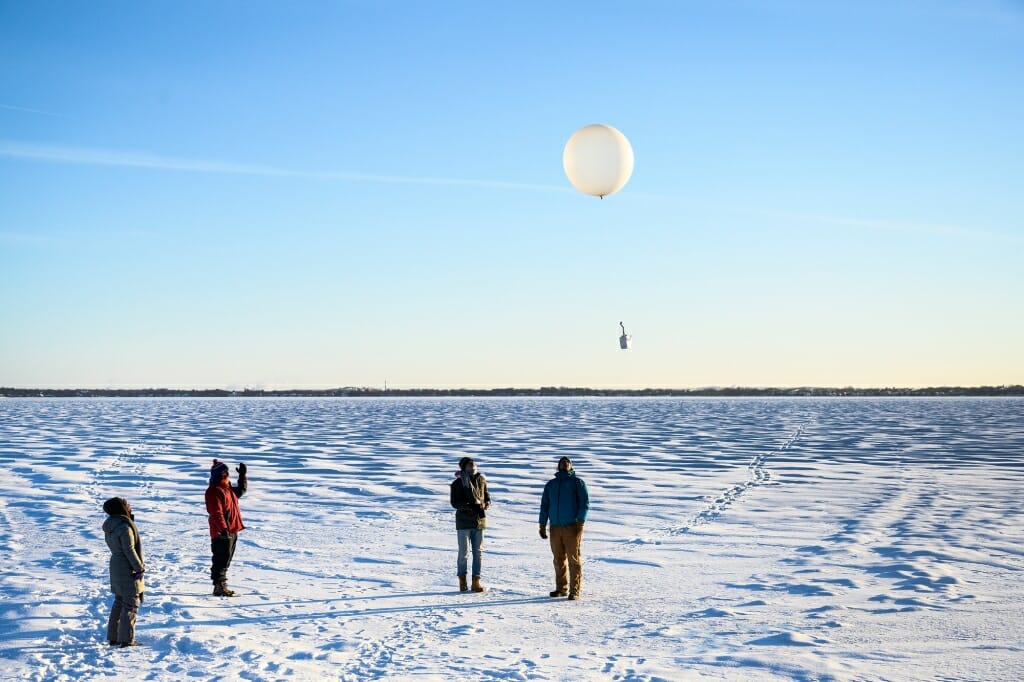 Upon the signal from Petty, the students released the weather balloon carrying the radiosonde. Petty immediately began to capture data from the instrument, which he could see on his computer. The balloon would travel as high as 20 miles above Earth’s surface and as far away as 100-miles before bursting and returning to the ground. The radiosonde would continue to transmit data, which Petty would analyze later to determine atmospheric conditions above Madison on an unusually cold winter day.