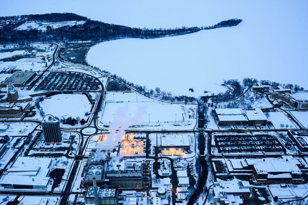 Photo: Aerial view of west campus buildings and lake