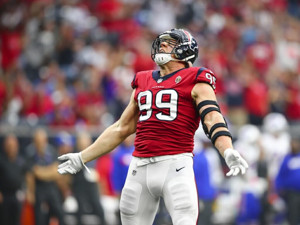 Photo: J.J. Watt holding out his arms to celebrate.