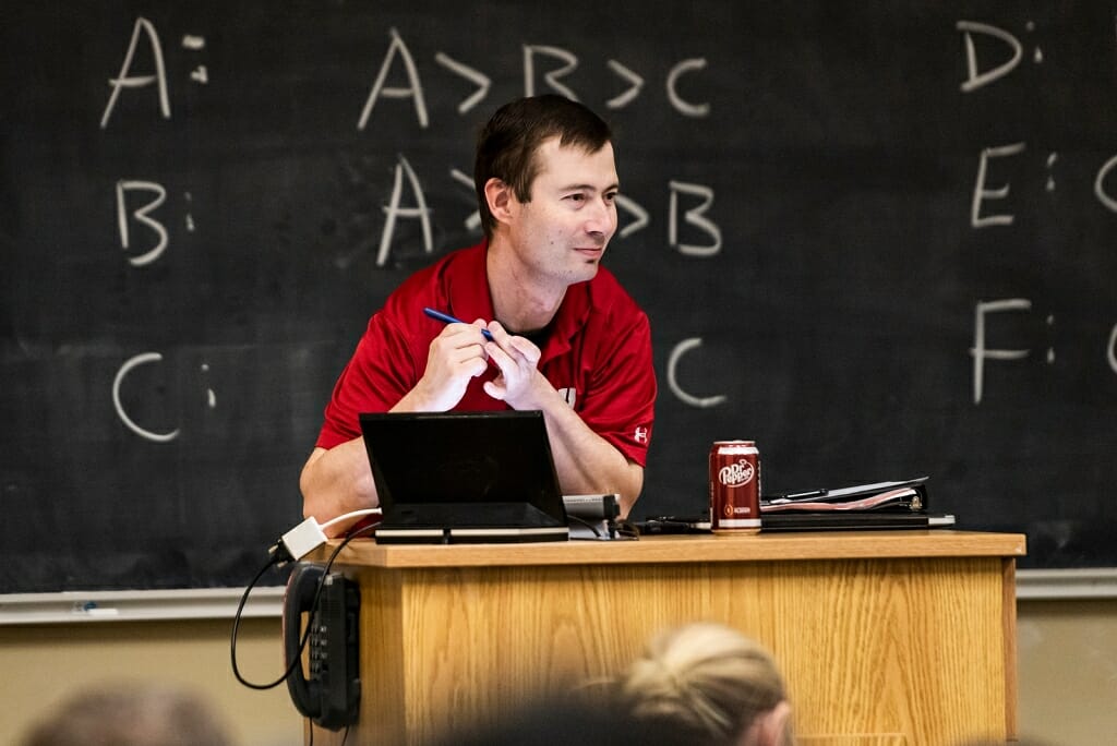 Photo: Matt at lectern with can of Dr Pepper on it