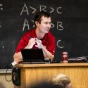 Photo: Matt at lectern with can of Dr Pepper on it