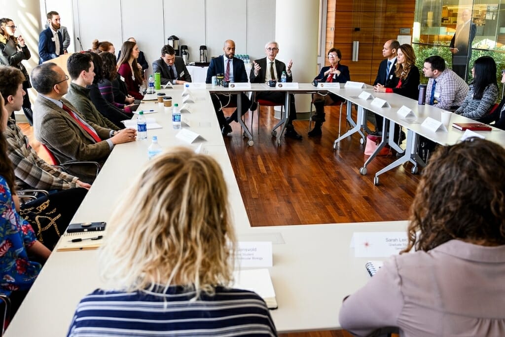 Photo: Evers & people sitting around table