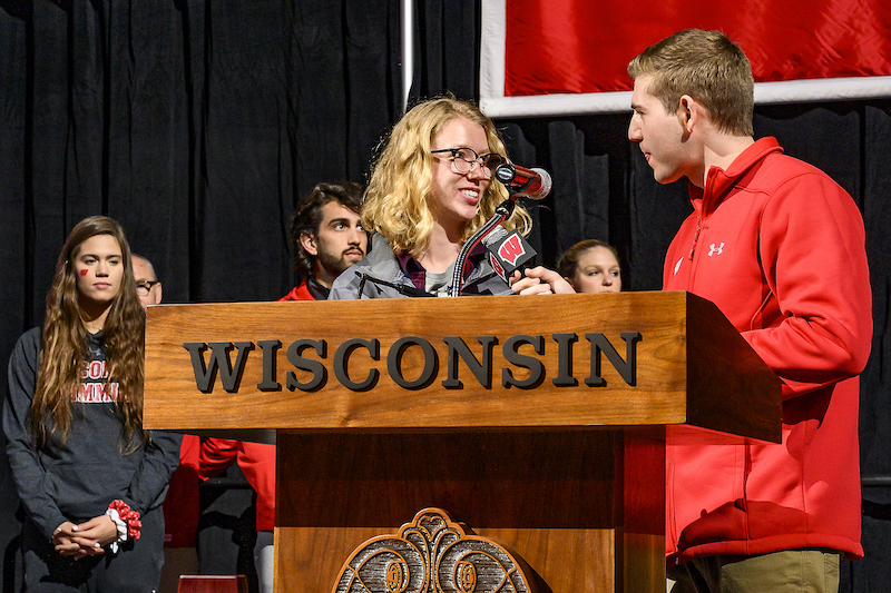 Photo of Alicia Monson speaking with Reid Magnum.