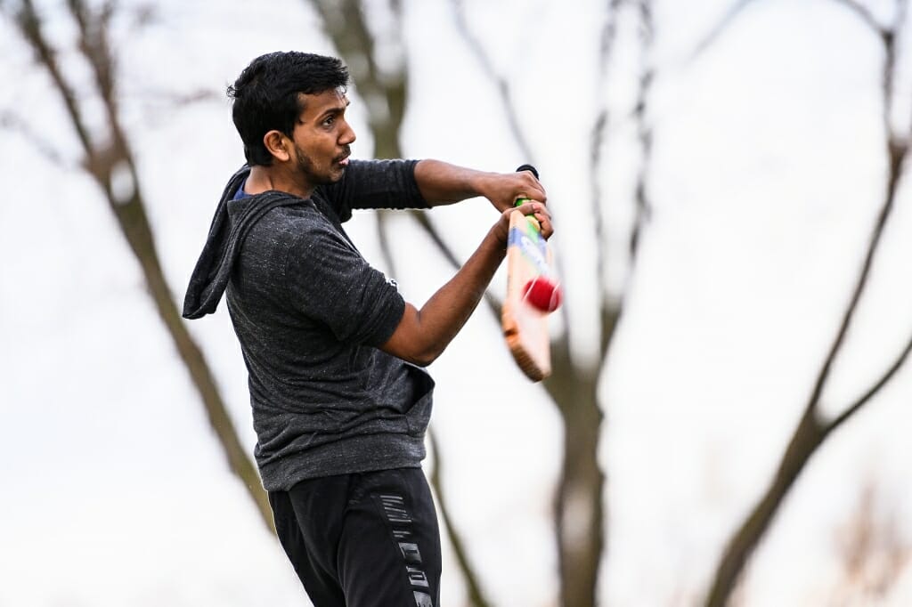 Photo: Man swinging bat