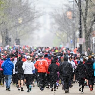 Photo: Participants fill State Street with the capital building looming in the background.