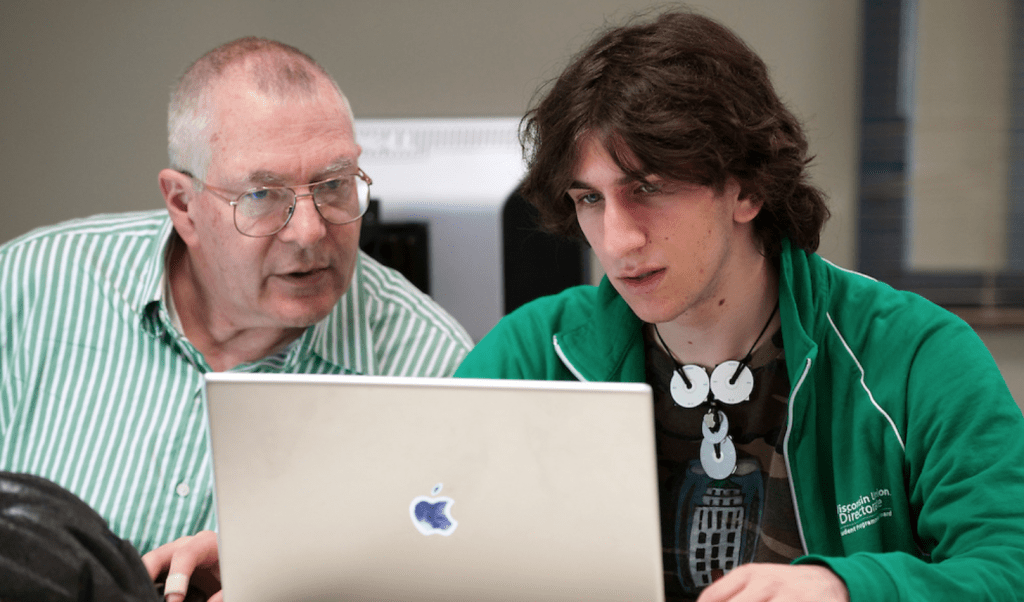 Undergraduate David Michaels (right), a first-year student studying engineering physics, works on his laptop in a computer lab in the Computer-Aided Engineering Center at the University of Wisconsin–Madison. Michaels is working on research with Porter and using computer-modeled data to study the hydrodynamics of leatherback sea turtles.