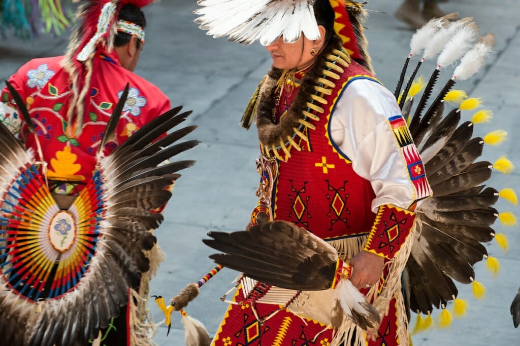 Photo: Costumed dancer taking part in Grand Entry