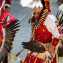 Photo: Costumed dancer taking part in Grand Entry