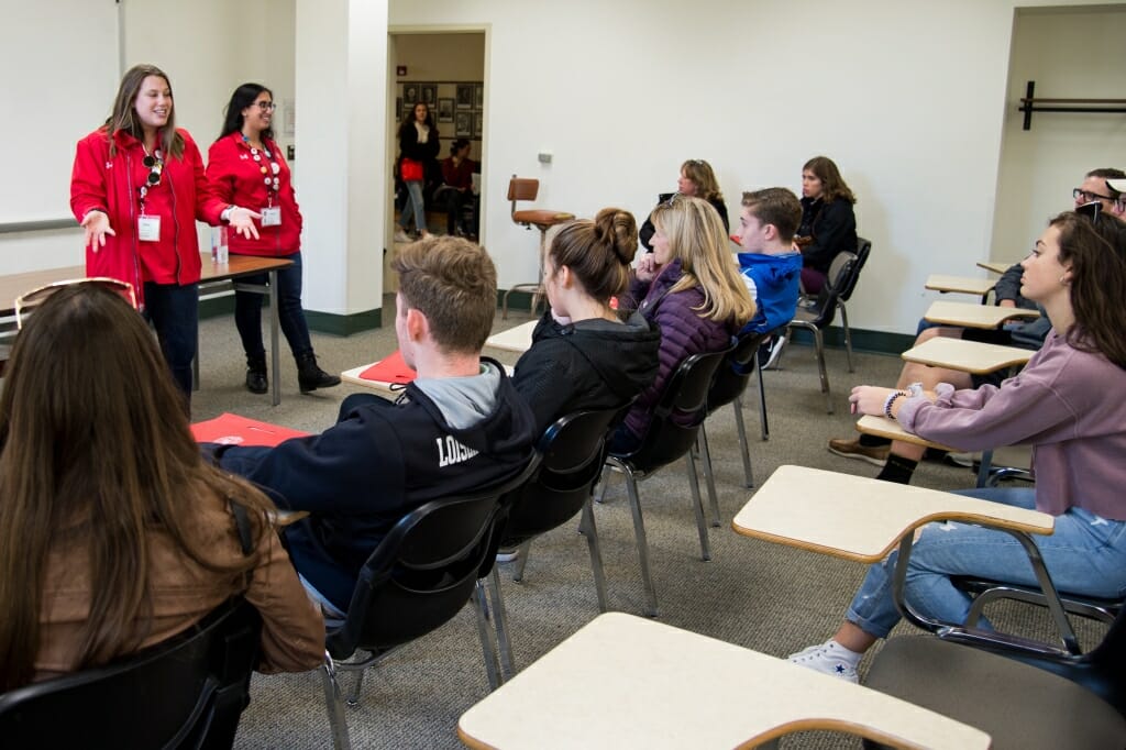 During an autumn tour, student guides Savi Lurie (left) and Jinan Sous (right) from Campus and Visitor Relations (CAVR) show prospective students and guests around the University of Wisconsin–Madison campus classrooms on Oct. 18, 2018. (Photo by Lauren Justice / UW–Madison)