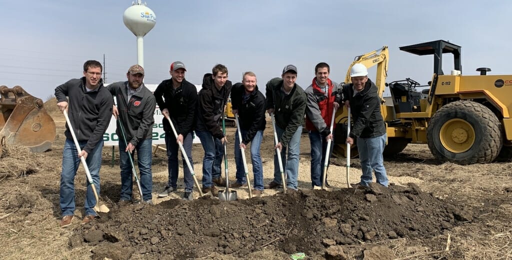 Photo: A group of men pose with shovels at a groundbreaking.