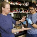 Photo: David Lynn and Harshit Agarwal looking at catheter