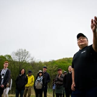 Photo: Bill speaking and gesturing