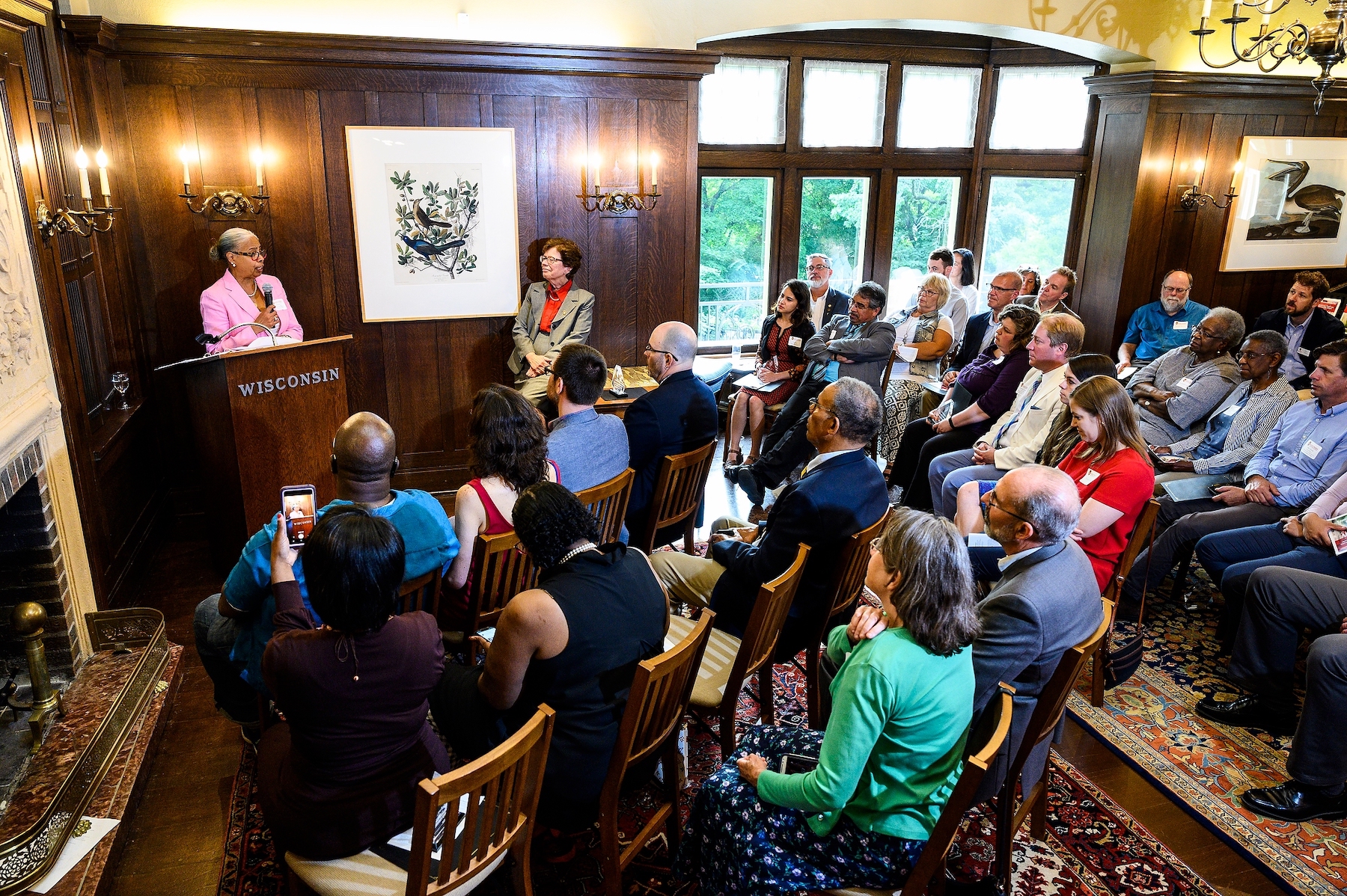 Photo of Gloria Ladson-Billings speaking at a podium to the audience at the Community University Partnership Awards.