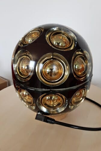 Photo: Spherical sensor module resting on table