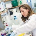 Photo: Beth Weaver working at lab bench